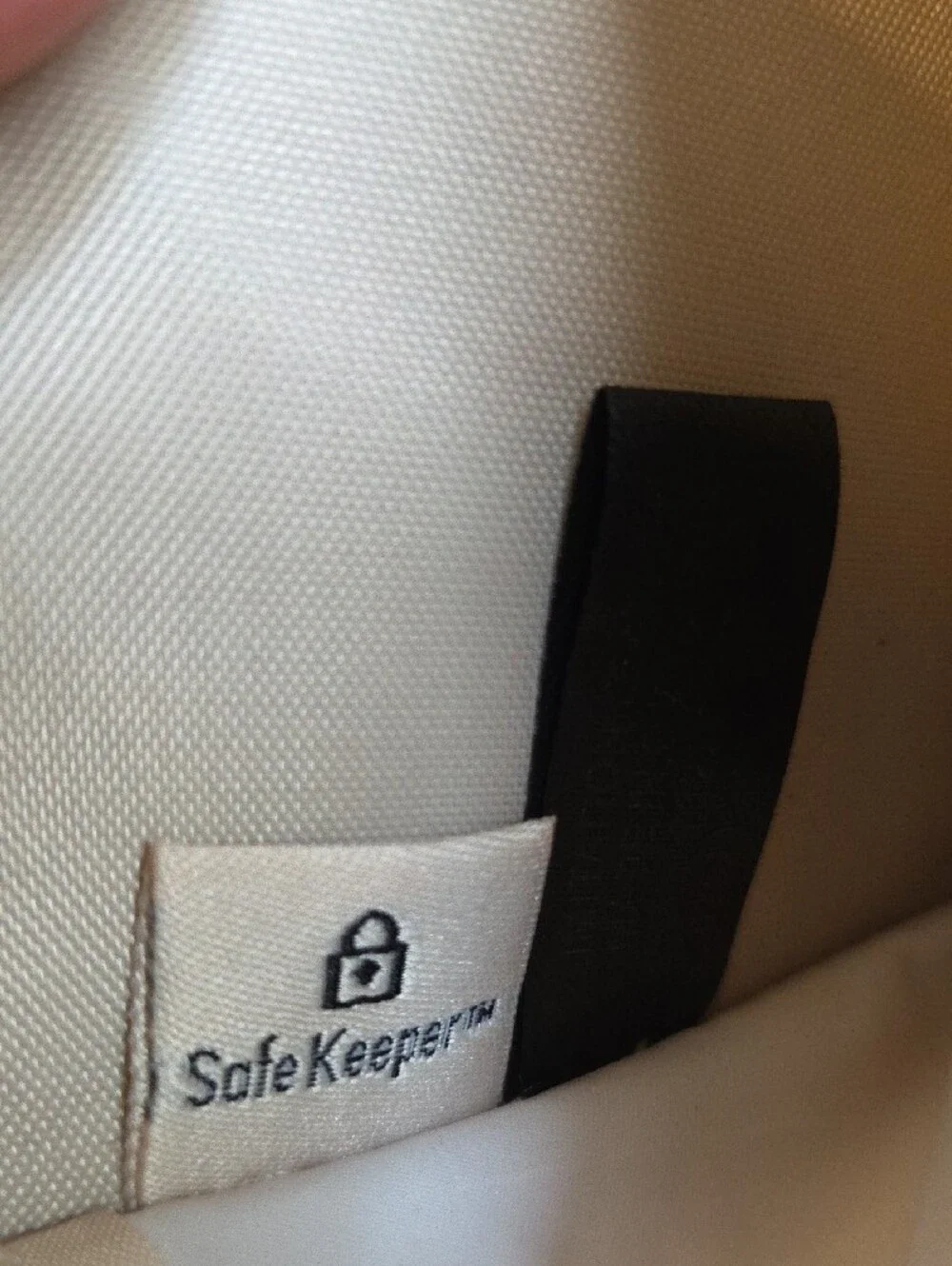 Safe Keeper Beige Textured Woven Zip Around Wristlet Wallet.